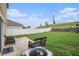 Large backyard featuring a patio and a privacy fence at 13246 Kent Bradley St, Dade City, FL 33525