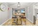 Bright dining area includes a high-top table, leather stools, and easy access to other living spaces at 13263 86Th Ave, Seminole, FL 33776