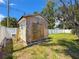 Backyard shed with ladder, featuring ample storage space and durable construction at 13263 86Th Ave, Seminole, FL 33776