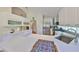 Stylish kitchen with white cabinetry, stainless appliances, and a spacious countertop with bar seating at 14502 Pond Cypress Way, Tampa, FL 33626