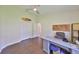 Bright office with a ceiling fan, closet, modern desk and decor at 14502 Pond Cypress Way, Tampa, FL 33626