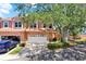 Charming townhome with a two-car garage and well-maintained landscaping at 14561 El Paseo Dr, Seminole, FL 33776