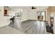 Inviting living room with hardwood floors, fireplace, and natural light at 14561 El Paseo Dr, Seminole, FL 33776