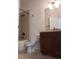 Bathroom features a tub/shower combination, toilet and single sink vanity at 1508 Talisker Dr, Clearwater, FL 33755