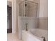 Bathroom features a soaking tub and walk-in shower with decorative tile at 1508 Talisker Dr, Clearwater, FL 33755