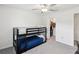 Bedroom with a bunk bed and a doorway to a walk-in closet at 17729 Nectar Flume Dr, Land O Lakes, FL 34638