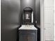 Modern powder room with dark walls, stylish mirror, and marble countertop at 17729 Nectar Flume Dr, Land O Lakes, FL 34638
