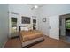 Bedroom with carpet, ceiling fan, a window, and minimalist decor at 1903 Curry Rd, Lutz, FL 33549