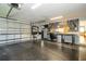 Spacious garage with a work bench and plenty of storage space at 1903 Curry Rd, Lutz, FL 33549