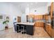 Spacious kitchen with a large island, modern appliances, and ample cabinet space at 1903 Curry Rd, Lutz, FL 33549