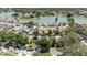 Community aerial view showcasing lakefront homes and lush green landscape in an attractive neighborhood at 1914 Elk Spring Dr, Brandon, FL 33511
