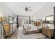 Tranquil main bedroom with a ceiling fan, natural light, and neutral colors at 1914 Elk Spring Dr, Brandon, FL 33511