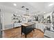 Well-appointed kitchen with an island, granite countertops, pendant lighting and stainless steel appliances at 1914 Elk Spring Dr, Brandon, FL 33511