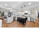 Bright kitchen features a central island, stainless steel appliances, and granite countertops at 1914 Elk Spring Dr, Brandon, FL 33511