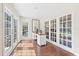 Bright office space with French doors offering natural light and backyard views at 1914 Elk Spring Dr, Brandon, FL 33511
