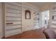 Cozy dining room with built-in shelves for elegant display and hardwood floors at 204 E North St, Tampa, FL 33604