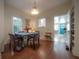 Inviting dining room with hardwood floors, adjacent to kitchen, perfect for entertaining at 204 E North St, Tampa, FL 33604