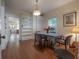 Bright dining room with hardwood floors, built-in shelving and natural light at 204 E North St, Tampa, FL 33604