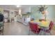 Retro kitchen features a colorful dining set, vintage appliances, and ample cabinet space at 204 E North St, Tampa, FL 33604