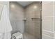 Walk-in shower featuring gray tiles and modern fixtures at 205 5Th N Ave # 501, St Petersburg, FL 33701