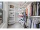 Organized walk-in closet features shelving, drawers, and hanging rods for ample storage at 205 5Th N Ave # 501, St Petersburg, FL 33701