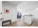 Inviting foyer leading to an open-concept living space with a kitchen island and bench seating at 205 5Th N Ave # 501, St Petersburg, FL 33701
