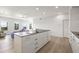 Open kitchen with large island, modern appliances, and sleek countertops; bright and airy space at 205 5Th N Ave # 501, St Petersburg, FL 33701