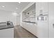 Modern kitchen featuring white cabinets, stainless steel appliances, and a kitchen island at 205 5Th N Ave # 501, St Petersburg, FL 33701