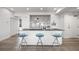 Bright, modern kitchen features a large island, stainless steel appliances, and open shelving at 205 5Th N Ave # 501, St Petersburg, FL 33701