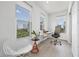 Bright home office with large windows, modern desk, and comfortable seating area at 205 5Th N Ave # 501, St Petersburg, FL 33701