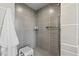 Walk-in shower with subway tile and an integrated shower seat at 205 5Th N Ave # 501, St Petersburg, FL 33701