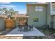 Charming backyard patio perfect for outdoor dining, with a view of the home's exterior at 2078 Madrid N Ct, Clearwater, FL 33763