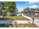 Charming home with driveway, landscaped yard offers curb appeal at 2078 Madrid N Ct, Clearwater, FL 33763