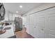 Kitchen with stainless steel refrigerator and white cabinets at 2078 Madrid N Ct, Clearwater, FL 33763