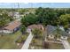 Aerial view of home with mature trees and surrounding neighborhood at 2104 E Navajo Ave, Tampa, FL 33612