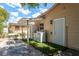 Backyard featuring outdoor laundry and exterior door at 2104 E Navajo Ave, Tampa, FL 33612