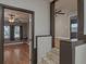 Inviting living room featuring hardwood floors, ceiling fan, and natural light from the window at 2104 E Navajo Ave, Tampa, FL 33612