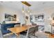 Bright dining room with stylish lighting, a large sideboard and easy access to the kitchen at 221 13Th Ne Ave, St Petersburg, FL 33701