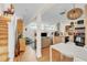 Cozy living room featuring modern kitchen, comfortable seating, and hardwood floors at 221 13Th Ne Ave, St Petersburg, FL 33701