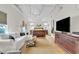Spacious main bedroom featuring vaulted ceiling and seating area and television at 221 13Th Ne Ave, St Petersburg, FL 33701