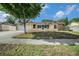 Lovely single-story home with attached garage and manicured lawn providing great curb appeal at 2632 Tung Dr, Holiday, FL 34691