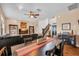 Open living space showcasing wood floors, stylish furnishings, staircase and seamless flow for modern living at 2712 Spring Meadow Dr, Plant City, FL 33566