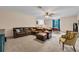 This living room features carpet flooring and neutral colored walls at 2712 Spring Meadow Dr, Plant City, FL 33566