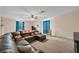 This living room offers carpet flooring and natural lighting at 2712 Spring Meadow Dr, Plant City, FL 33566