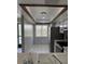 Well-lit kitchen features tile floors, a view from the window, and appliances at 2753 Countryside Blvd # 107, Clearwater, FL 33761