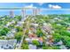 Picturesque aerial view of a residential neighborhood with waterfront buildings in the background at 2936 W Knights Ave # A, Tampa, FL 33611