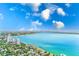 Breathtaking aerial shot featuring waterfront homes, condos, and the city skyline along the coast at 2936 W Knights Ave # A, Tampa, FL 33611