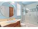 Stylish bathroom with walk in shower and blue paint at 2936 W Knights Ave # A, Tampa, FL 33611