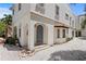 Elegant arched entrance with stone accents, leading into this immaculate home at 2936 W Knights Ave # A, Tampa, FL 33611