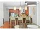 Gourmet kitchen boasts a large island, stainless steel appliances, and custom cabinetry at 2936 W Knights Ave # A, Tampa, FL 33611
